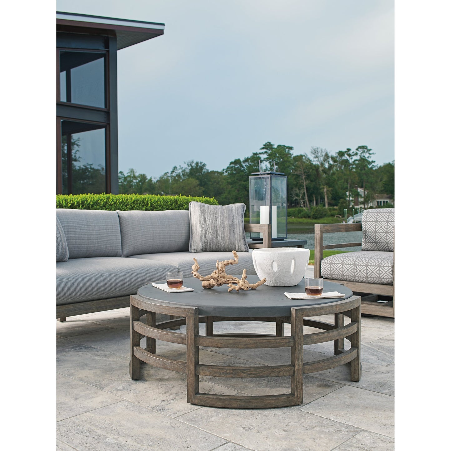 003 SI-1770887 | Lifestyle | La Jolla Cocktail Table by Tommy Bahama Outdoor in vintage. Made from unique in a transitional style.