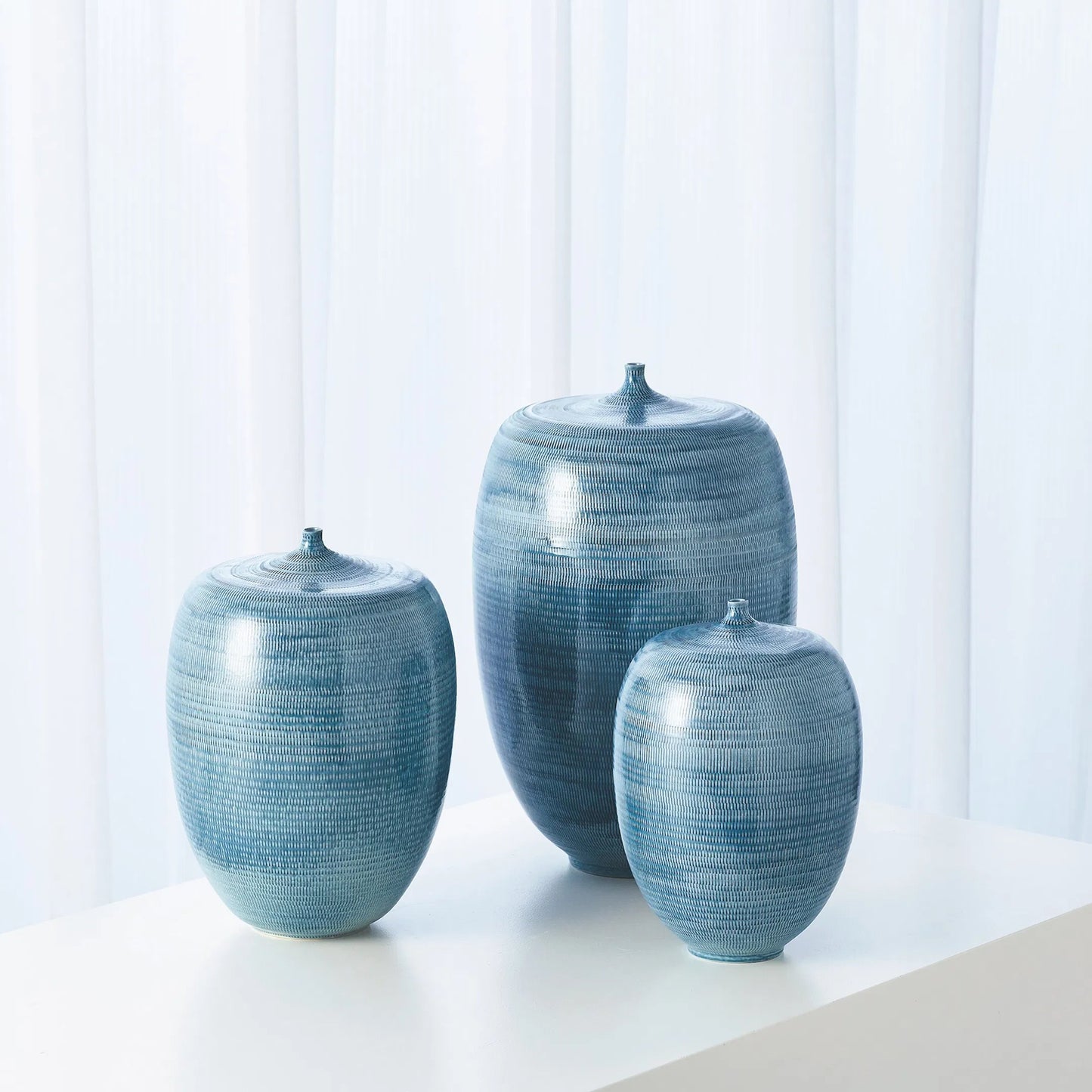 011 SR-701189,SR-701190,SR-701191 | Additional Silo | Fat Bottle by Global Views. Made from porcelain in a coastal style.