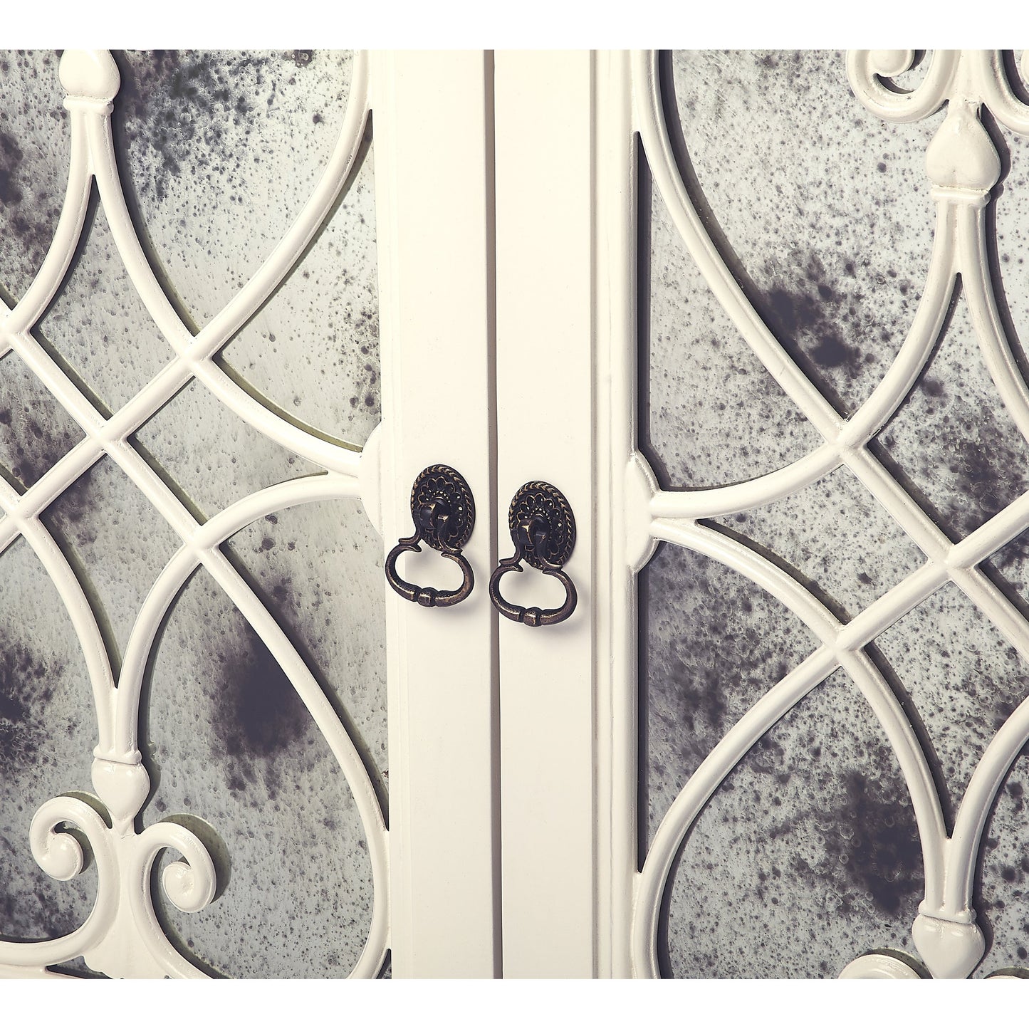 004 S-346233 | Closeup | Finney Chest by Butler Specialty Company in white and white. Made from mindi wood solids, mdf, antique mirrored glass, hardware: steel in a transitional style.