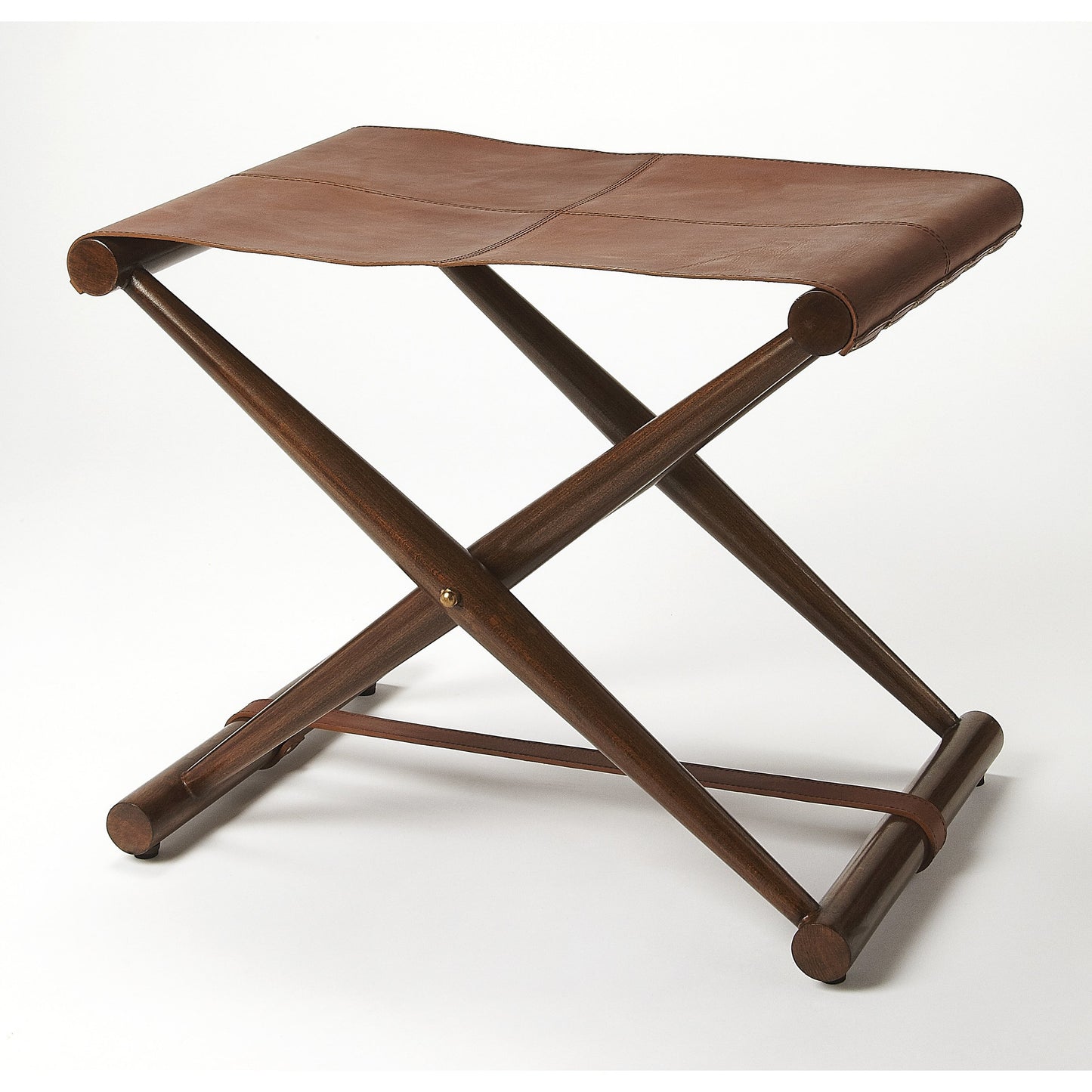002 S-346382 | Additional Silo | Sutton Leather Folding Stool by Butler Specialty Company in medium brown and butler loft. Made from natural leather, shorea, meranti wood solids in a rustic style.