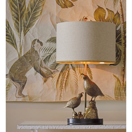 Codorniz Table Lamp by Currey and Company in antique brass, black. Made from cast aluminum, granite in a modern style.