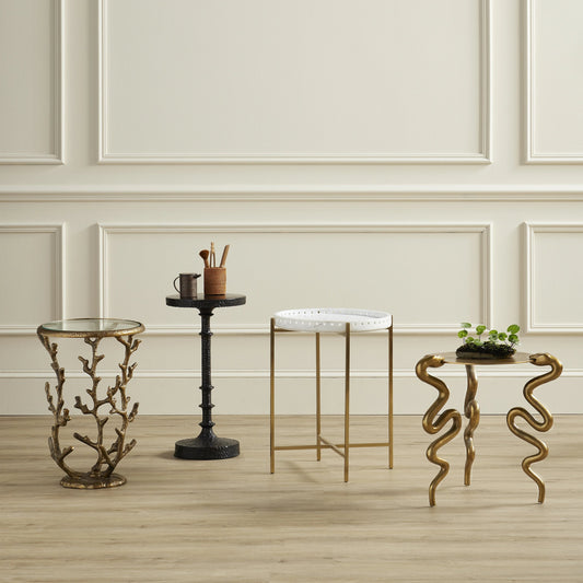 Coral Accent Table by Currey and Company in antique brass, clear. Made from cast aluminum, glass in a modern style.