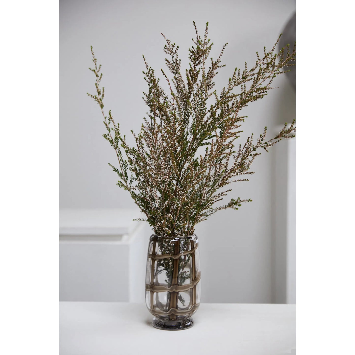 004 SI-2539597 | Lifestyle | Enveloped Vase by Accent Decor in brown. Made from glass in a unique style.