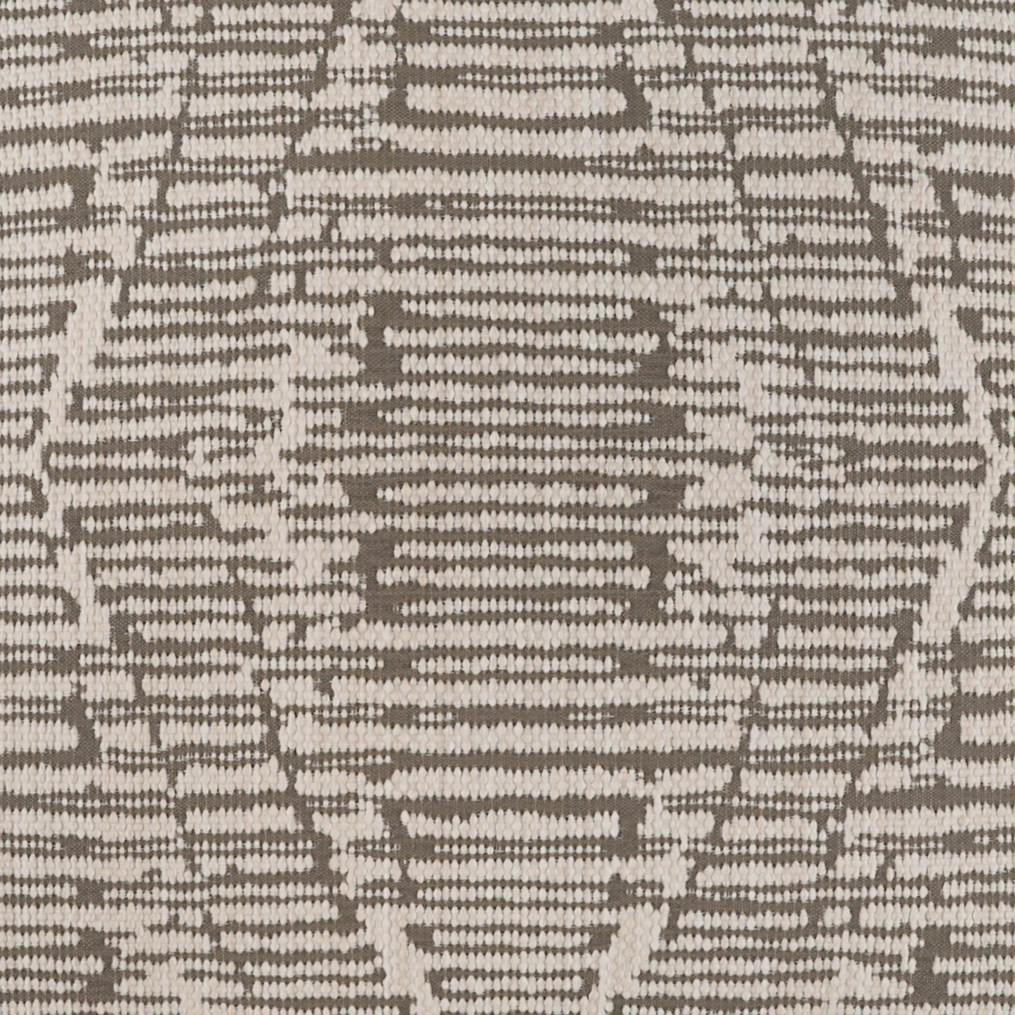 003 SI-2381902 | Closeup | Ozetta Pillow by DV Kap Home in driftwood. Made from 75.37% olefin, 24.63% polyester (uv) in a unique style.
