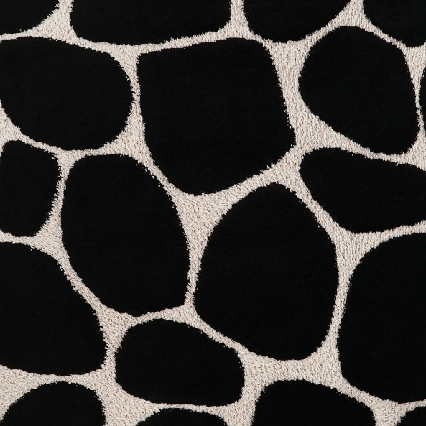 003 SI-2381509 | Closeup | Kalani Pillow by DV Kap Home in onyx. Made from 59% viscose, 25% cotton, 16% polyester in a eclectic & global style.