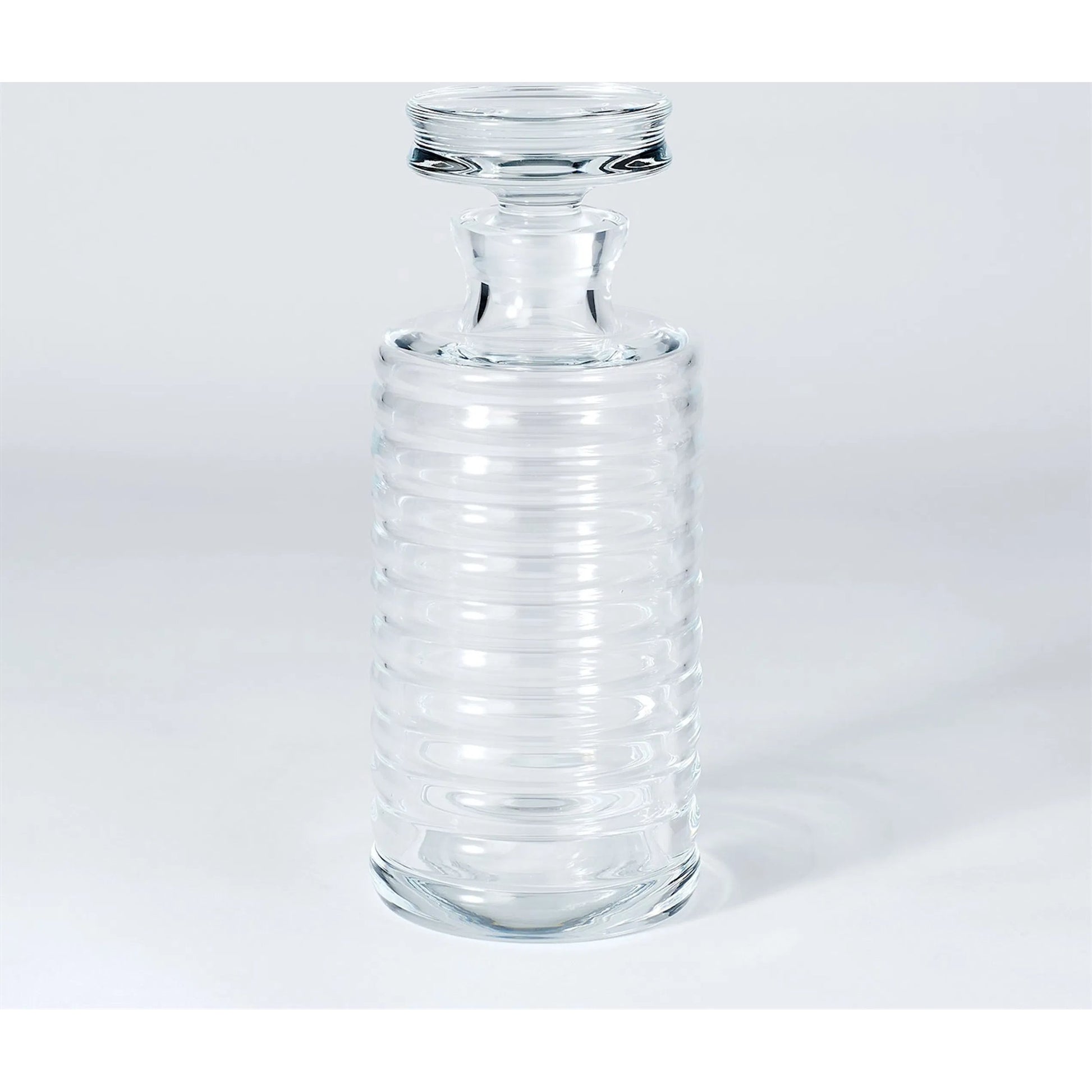 Ribbed Decanter by Global Views. Made from glass in a transitional style.