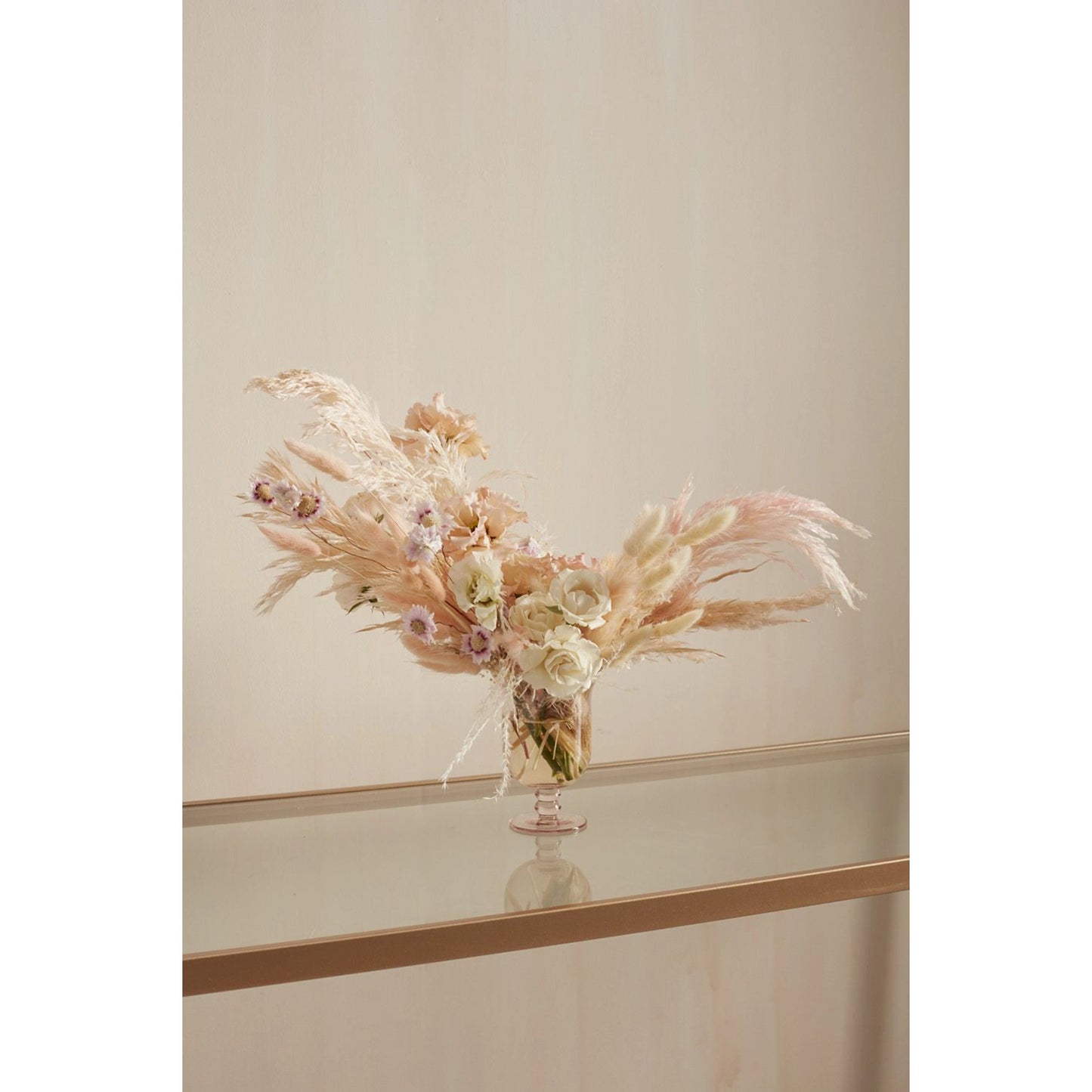 003 SI-2086429 | Lifestyle | Vesna Footed Vase by Accent Decor in pink. Made from glass in a modern style.