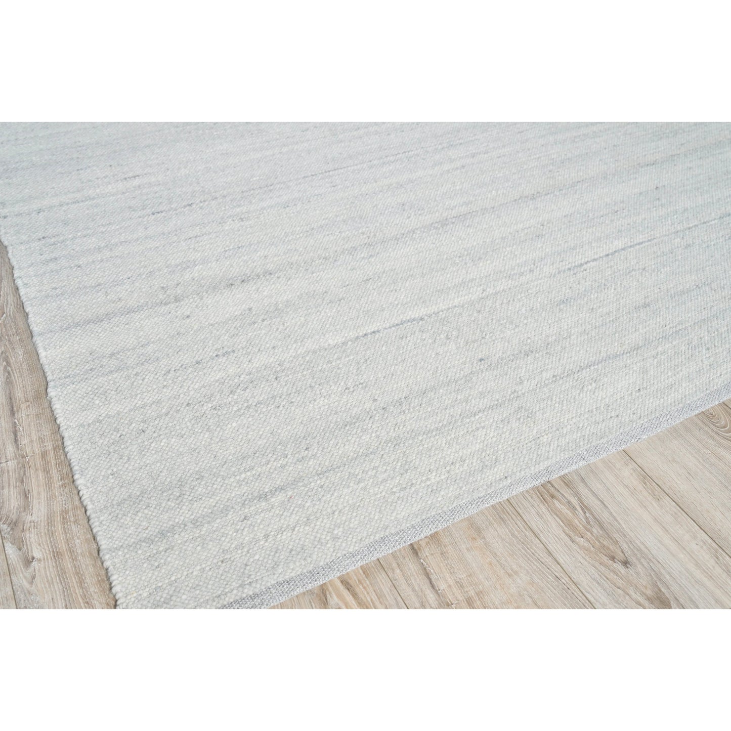 002 SI-2101291,SI-2222084,SI-2293719 | Closeup | Tocayo 4596 Rug by Exquisite Rugs in ivory, light blue. Made from new zealand wool in a unique style.