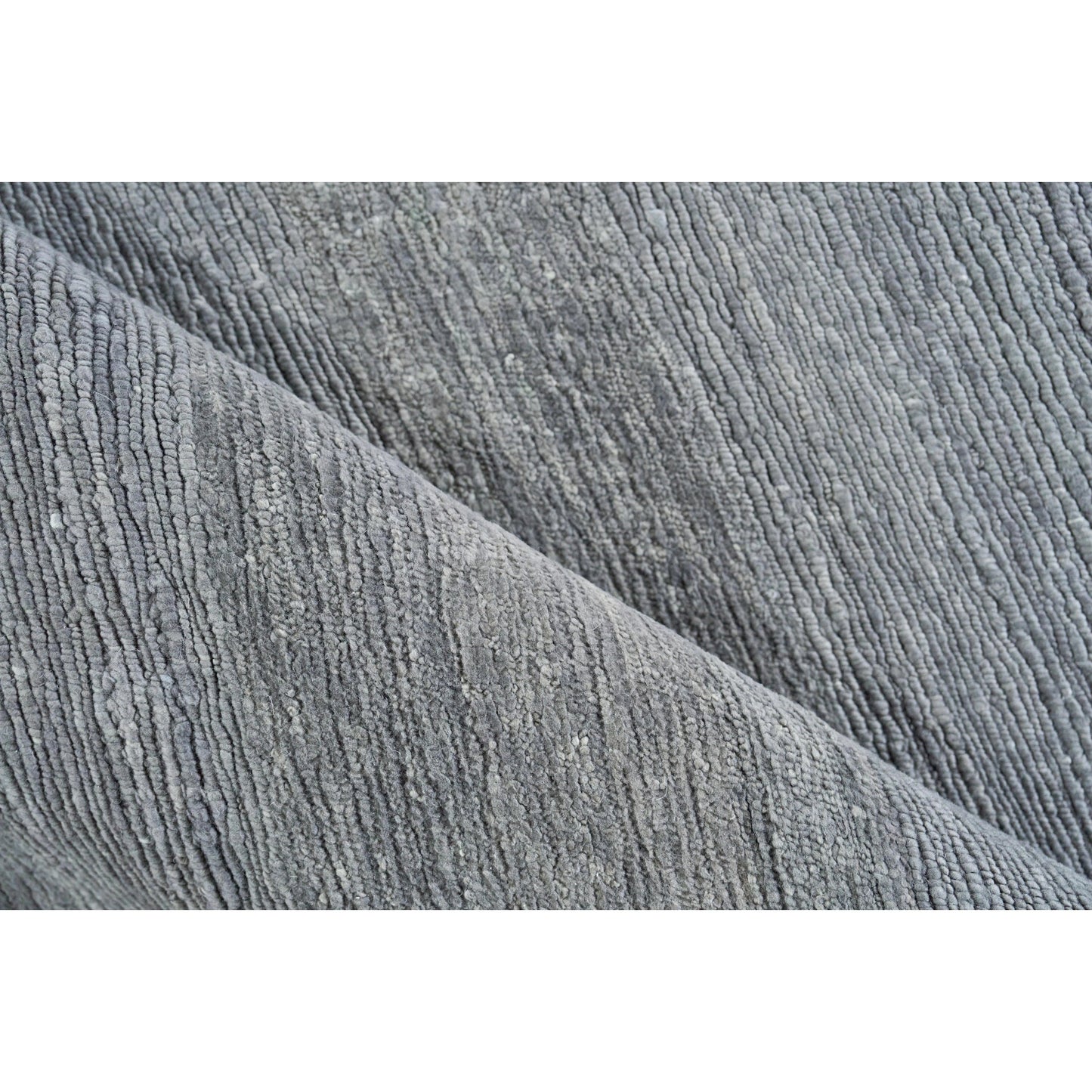 004 SI-2101338,SI-2101339,SI-2101340,SI-2101341,SI-2101342,SI-2222147,SI-2293759 | Closeup | Merino Wool 4805 Rug by Exquisite Rugs in dark gray. Made from merino wool in a unique style.
