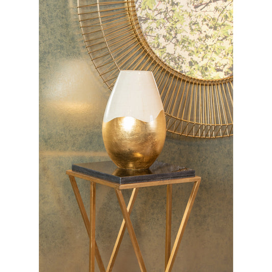 Malcolm Pedestal by Wildwood in natural black, antique gold leaf. Made from stone in a modern style.