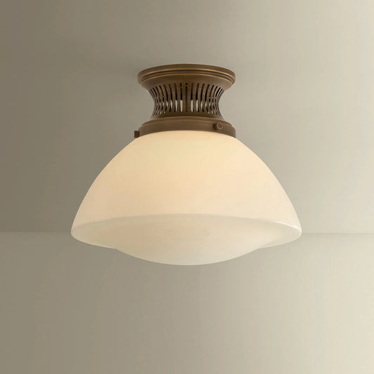 Bruceville Flush Mount by Hudson Valley in historic bronze. Made from glass in a unique style.