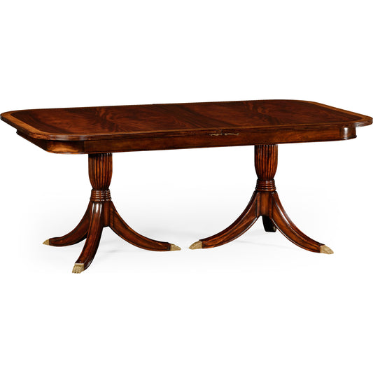 Buckingham Regency Crotch Mahogany Extending Dining Table by Jonathan Charles in brown and medium antique mahogany. Made from acacia in a traditional style.