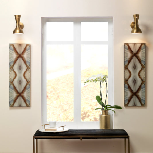 Pisa Wall Sconce by Jamie Young. Made from steel in a modern style.