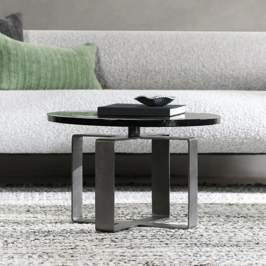 Keith 28" Industrial Glass Black Coffee Table by Classic Home in black. Made from cast glass, iron in a modern style.
