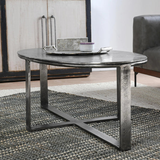 Flores 48" Oval Coffee Table by Classic Home in nickel. Made from cast aluminum in a modern style.