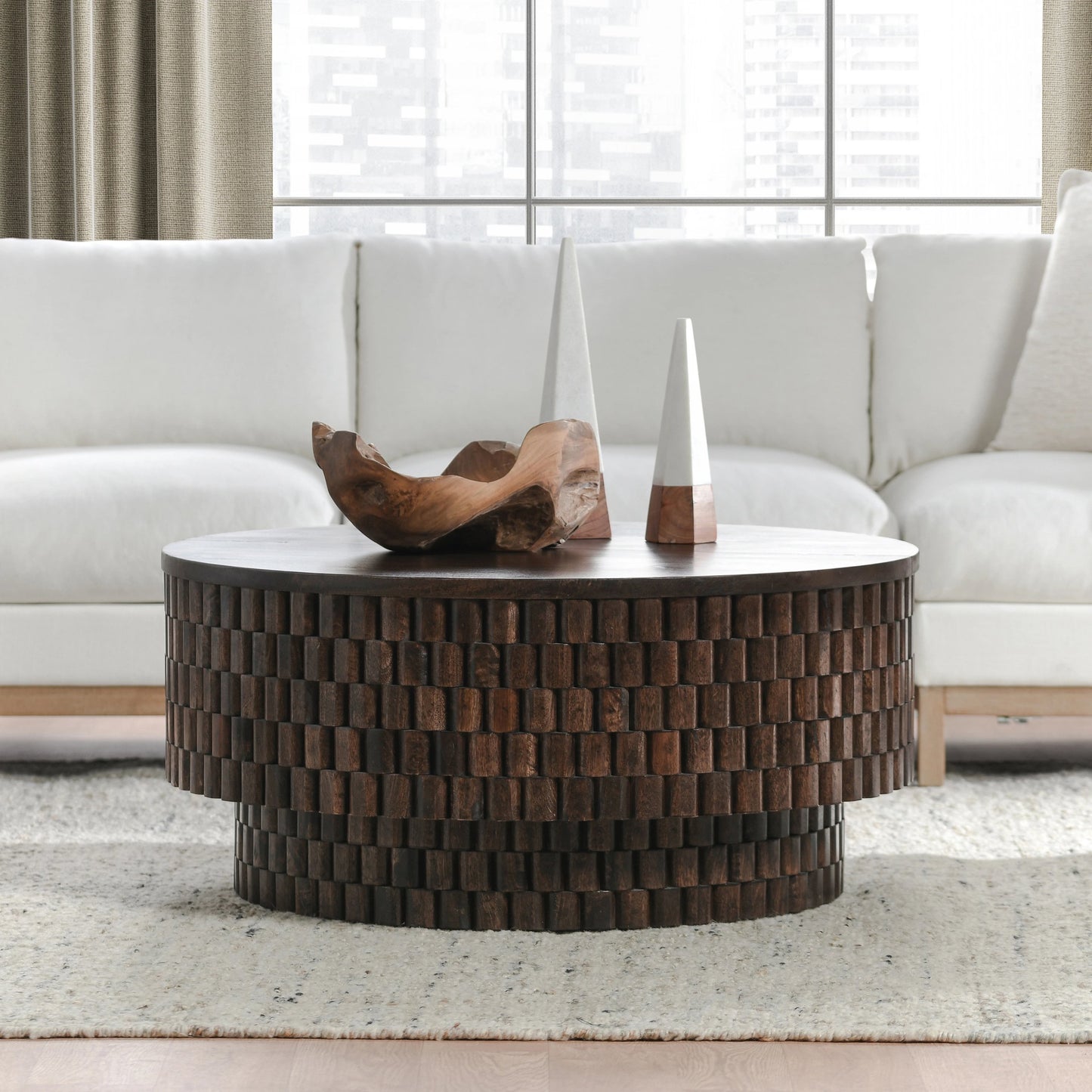 009 SI-2160256 | Closeup | Norwood Round Coffee Table by Classic Home. Made from mango wood in a modern style.