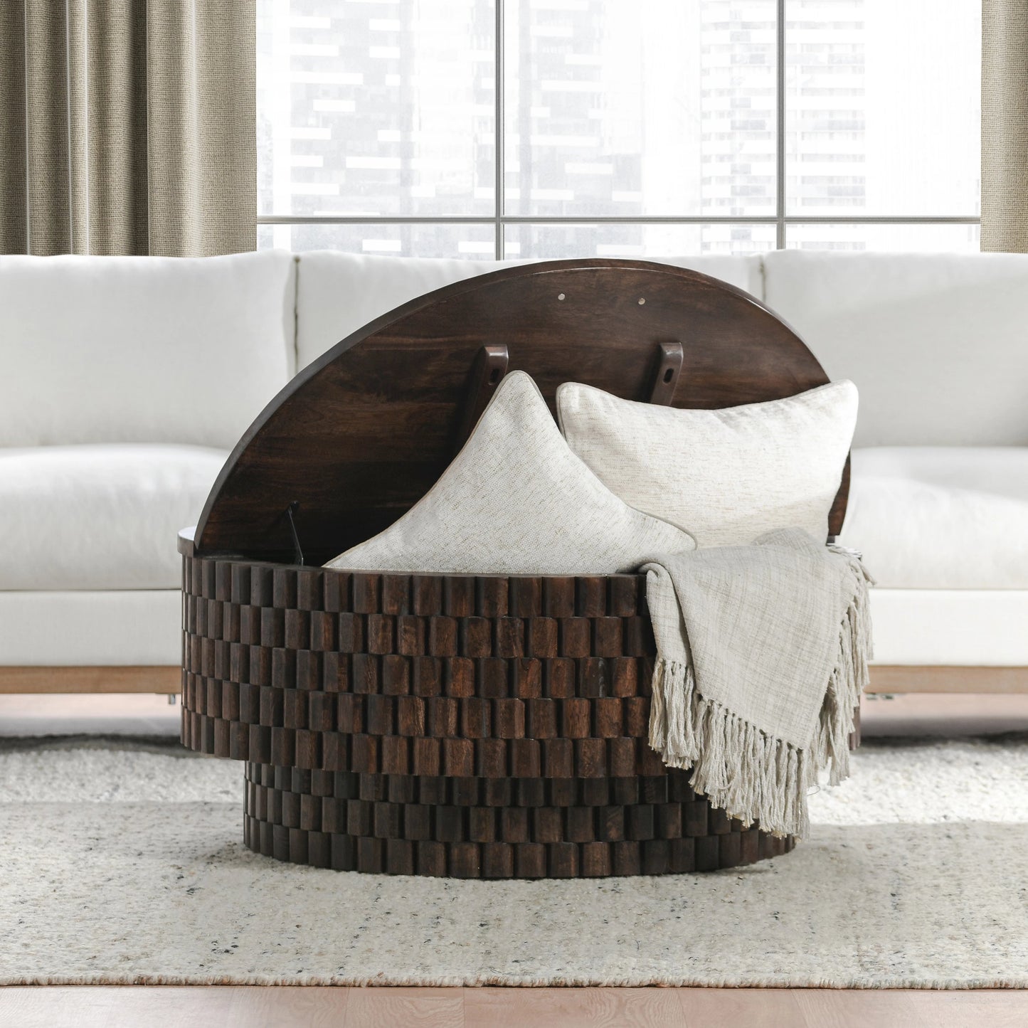 010 SI-2160256 | Closeup | Norwood Round Coffee Table by Classic Home. Made from mango wood in a modern style.