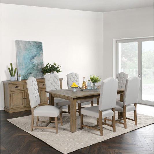 Driftwood Extension Dining Table by Kosas Home in desert gray. Made from reclaimed pine wood in a rustic style.