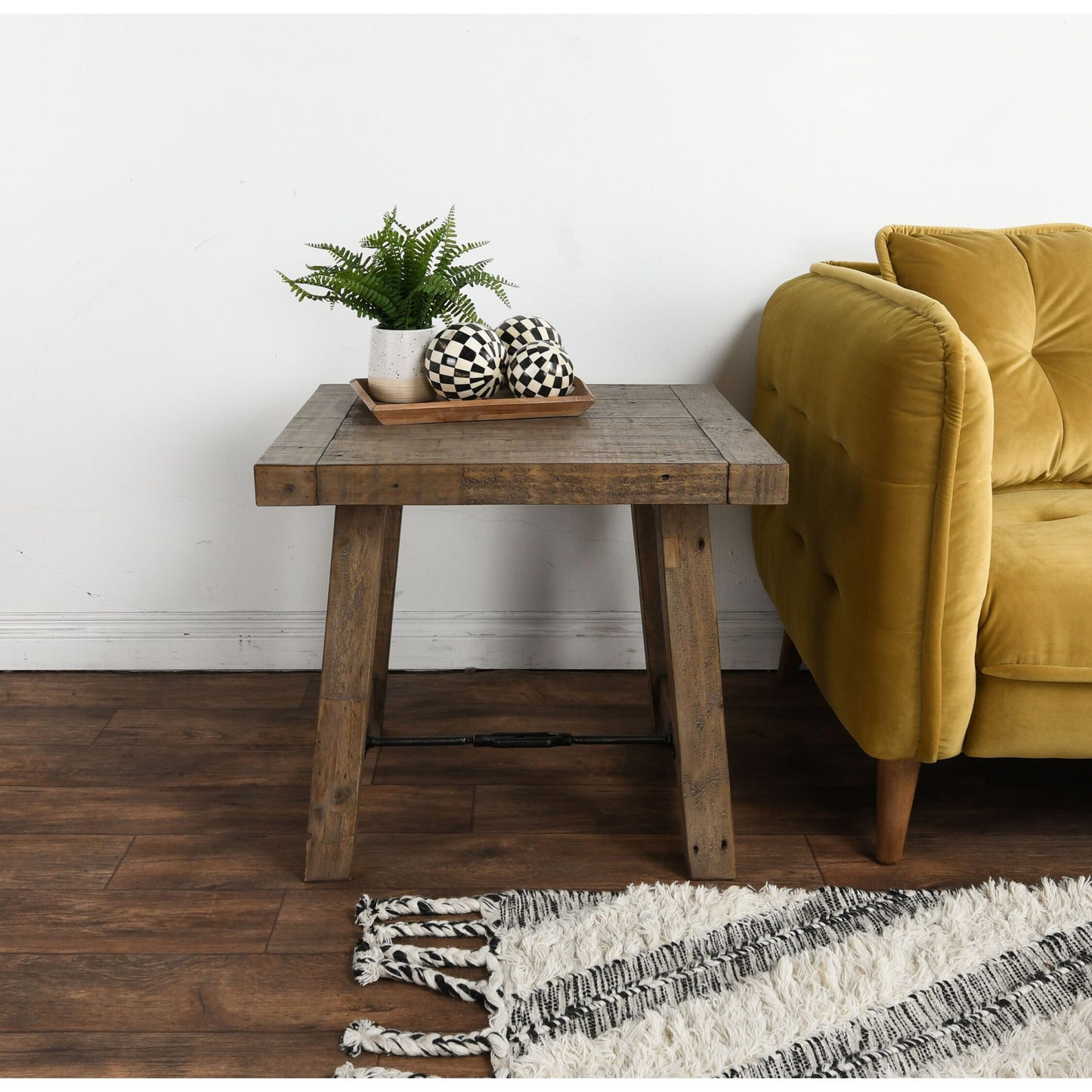 009 SR-897834 | Lifestyle | Tuscany End Table by Kosas Home in weathered gray. Made from reclaimed pine wood in a rustic style.