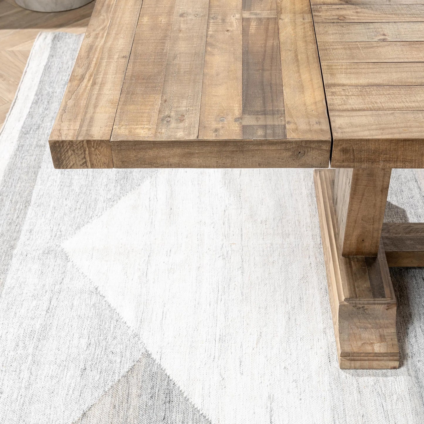 005 SI-2353724 | Closeup | Dita Reclaimed Pine Wood Extendable Dining Table by Kosas Home in natural. Made from reclaimed pine in a transitional style.