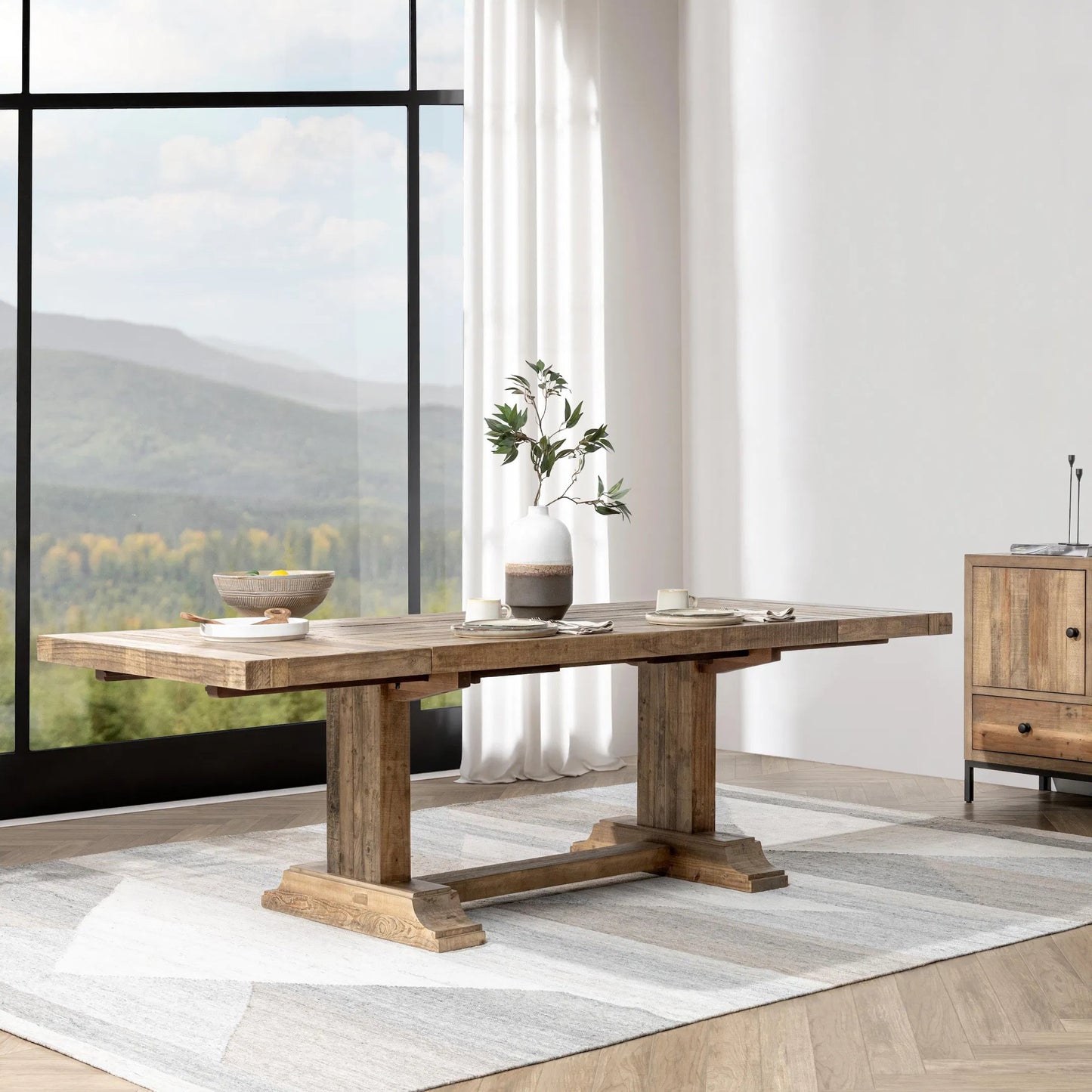 011 SI-2353724 | Lifestyle | Dita Reclaimed Pine Wood Extendable Dining Table by Kosas Home in natural. Made from reclaimed pine in a transitional style.