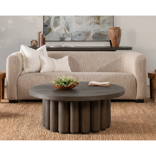 Tiber Round Wood Coffee Table by Classic Home. Made from oak wood, oak veneer in a transitional style.