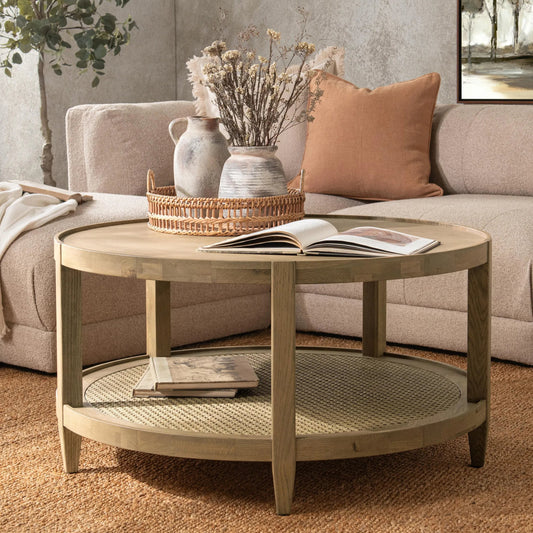 Devin Oak Wood Round Coffee Table by Classic Home in natural. Made from oak veneer, oak wood, cane in a transitional style.