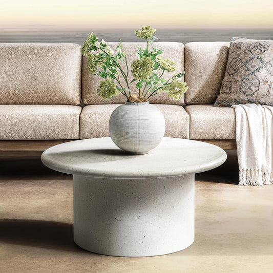 Nysa Outdoor Concrete Coffee Table by Classic Home in white. Made from glass fiber reinforced concrete in a unique style.