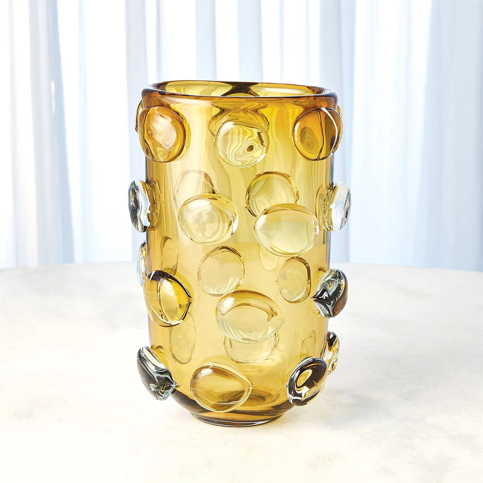 Rondelle Vase by Global Views. Made from art glass in a modern style.