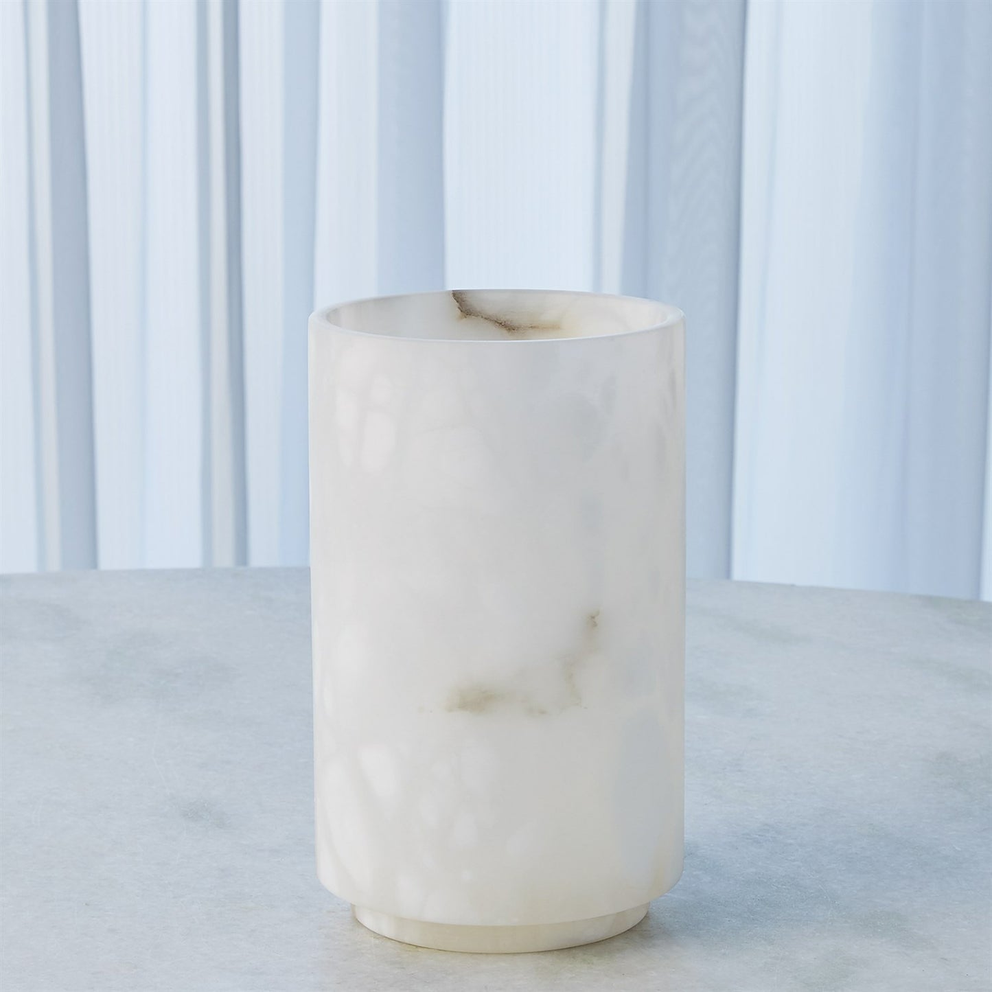 003 SR-939715 | Lifestyle | Alabaster Cylinder Vase by Global Views in white. Made from alabaster in a modern style.