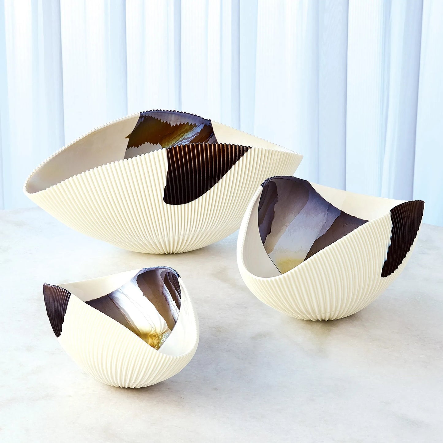 004 SR-892811,SR-892812,SR-892813 | Lifestyle | Pleated Bronze Stripe Bowl by Global Views in bronze stripe. Made from artglass in a modern style.