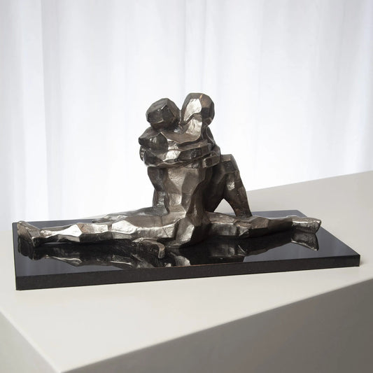 Gittin It on Sculpture by Global Views. Made from cast iron, granite in a modern style.