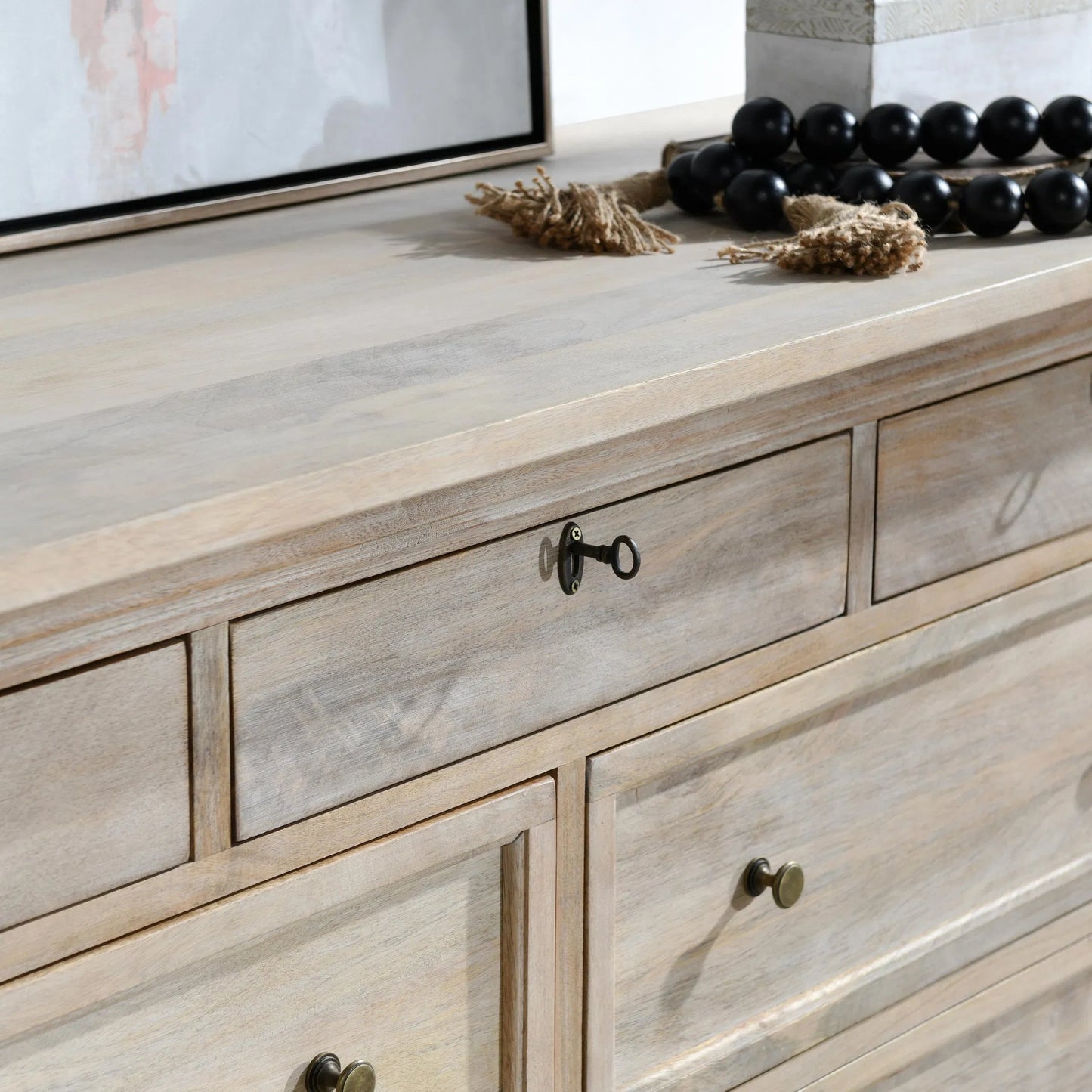 007 SI-2256329 | Closeup | Adelaide 9-Drawer Mango Wood Dresser by Classic Home in white wash. Made from mango wood in a transitional style.