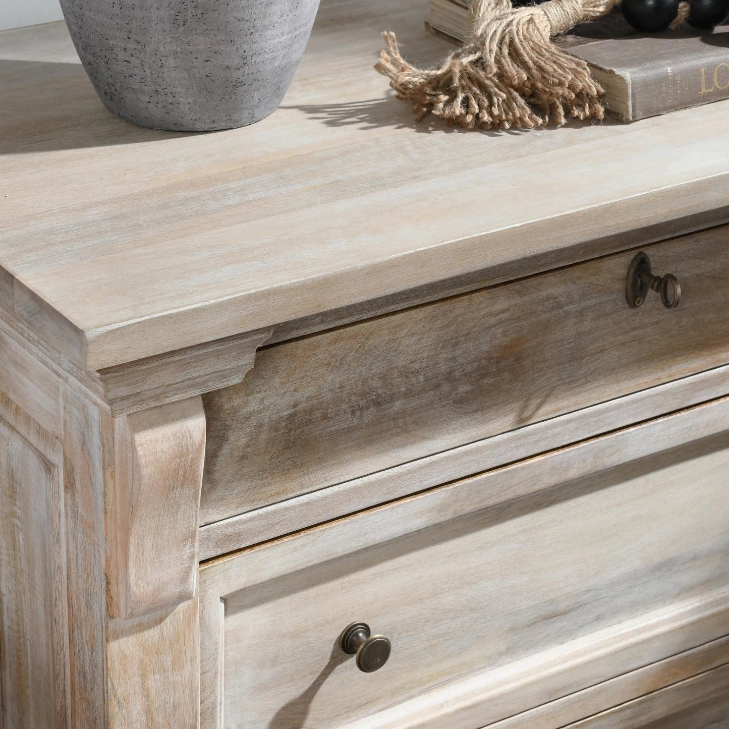 008 SI-2249244 | Closeup | Adelaide Three-Door Mango Wood Nightstand by Classic Home in white wash. Made from mango wood in a transitional style.