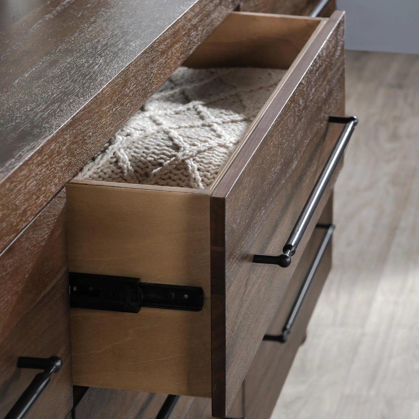 009 SI-2238868 | Closeup | Jaxon Nine-Drawer Acacia Wood Dresser by Classic Home in cocoa brown. Made from acacia wood in a traditional style.