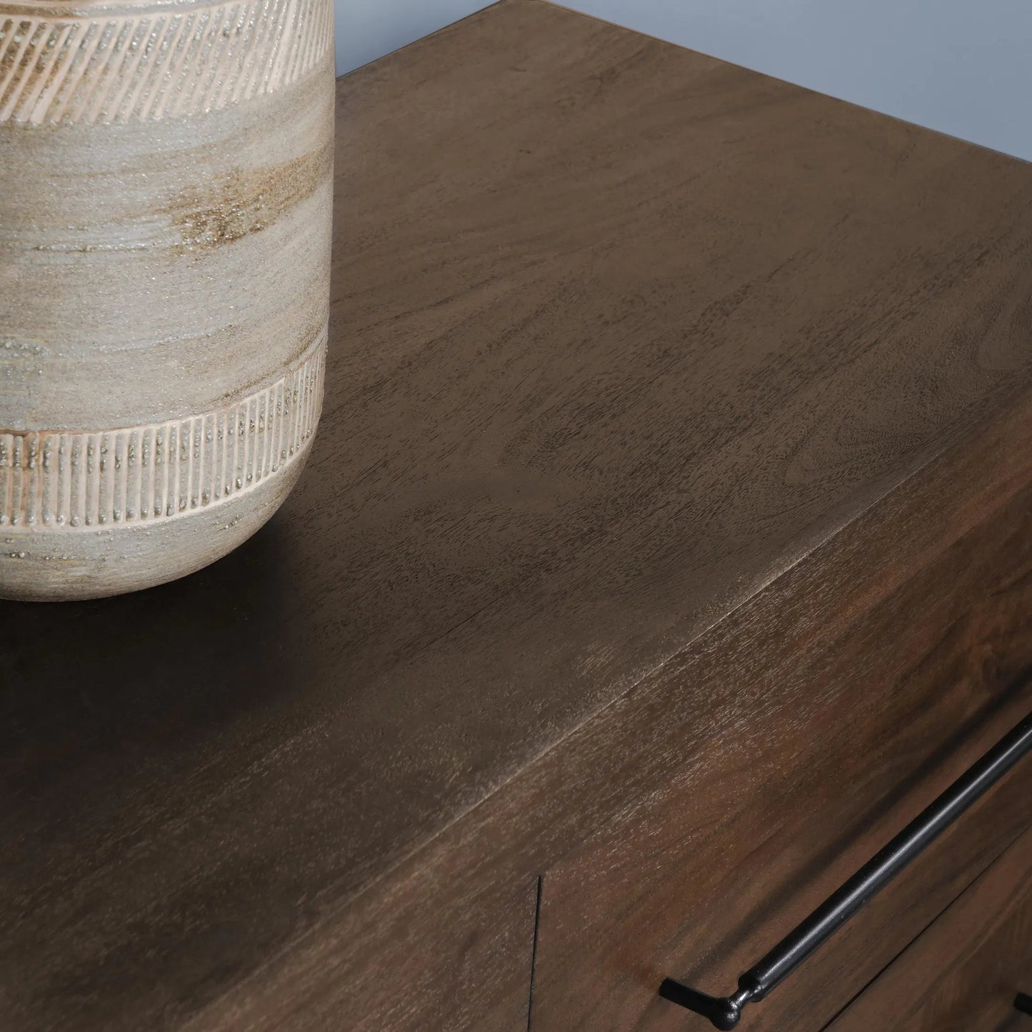 006 SI-2238868 | Closeup | Jaxon Nine-Drawer Acacia Wood Dresser by Classic Home in cocoa brown. Made from acacia wood in a traditional style.