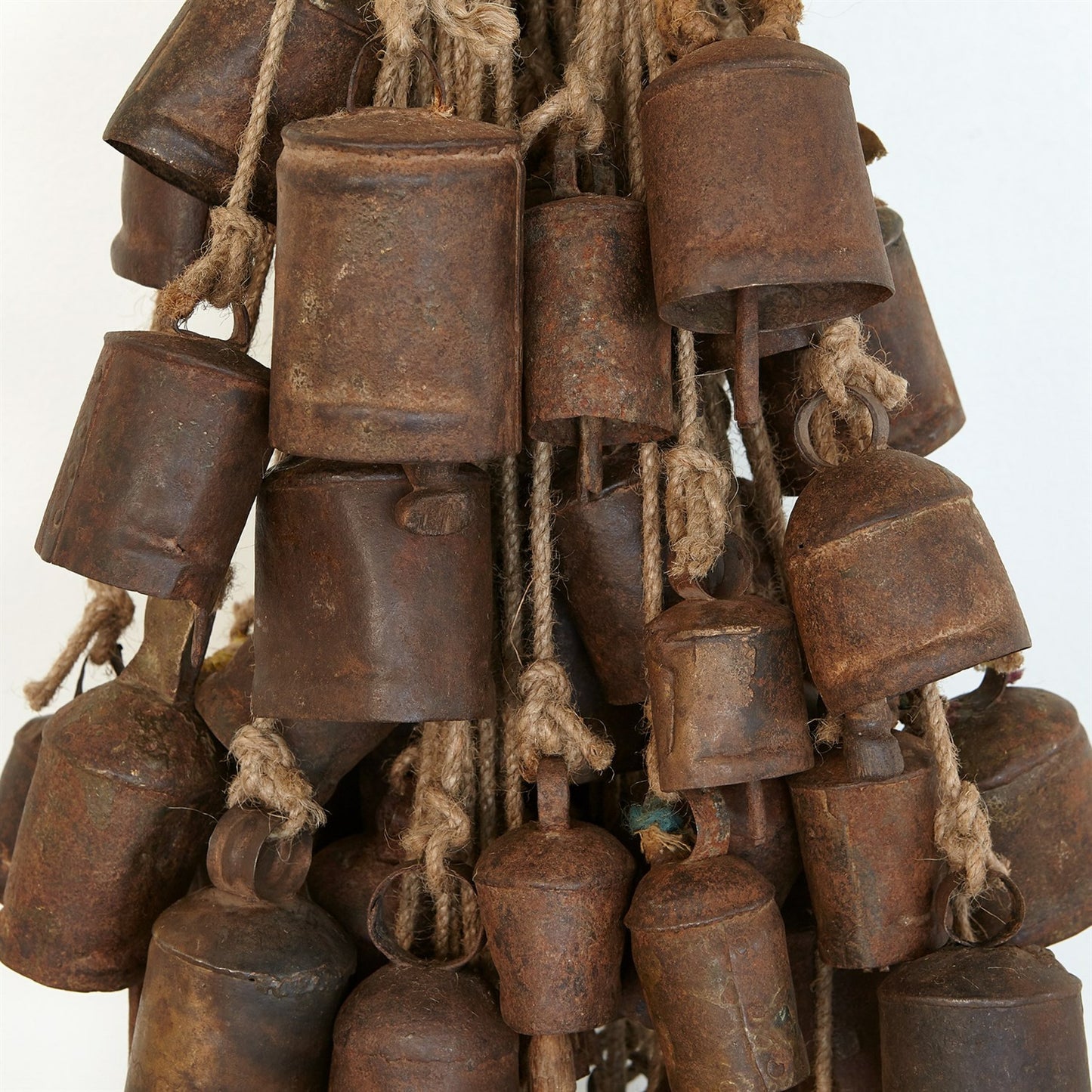 005 SR-939744 | Closeup | Bells Wall Art by Global Views. Made from iron, rope, wood in a coastal style.