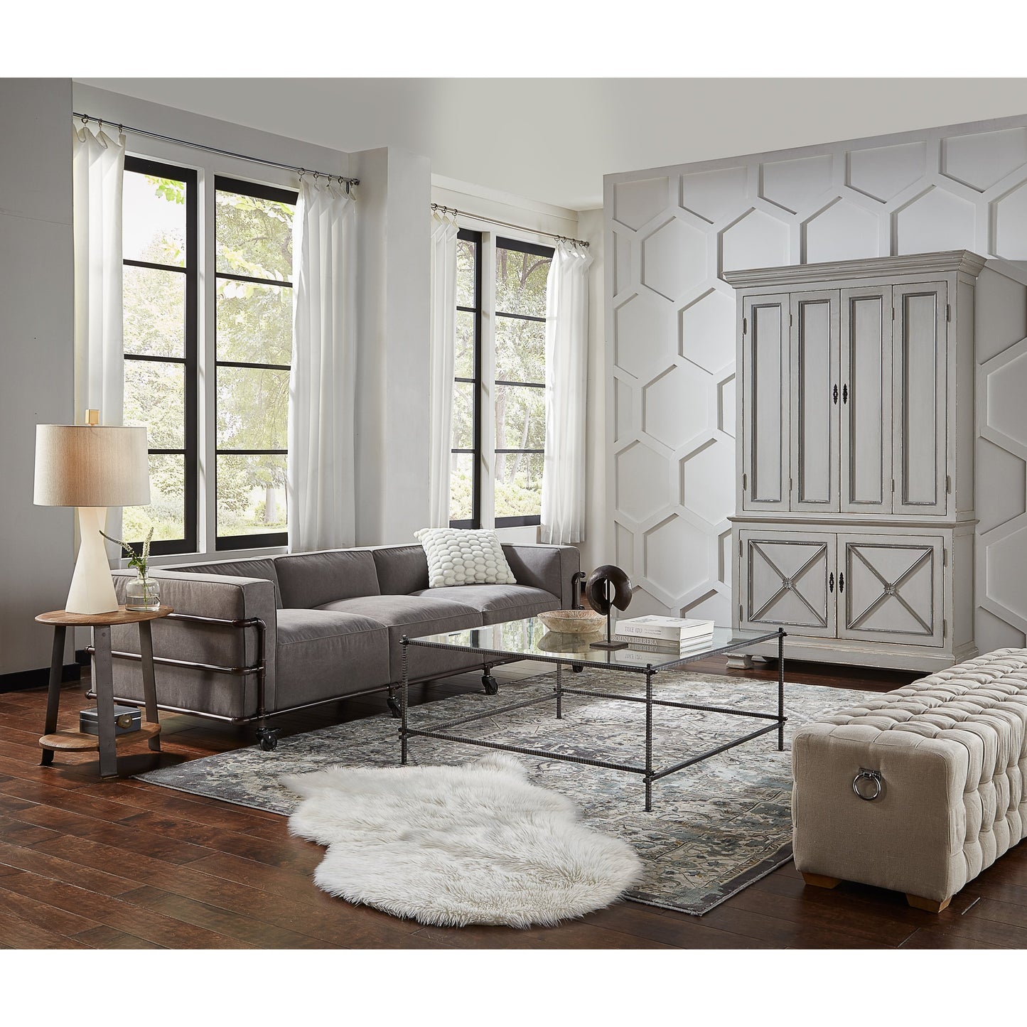 006 SR-858082 | Lifestyle | Serrated Edge Iron Coffee Table by Sarreid Ltd. in white and 1/2" tempered glass top. Made from glass, iron in a modern style.