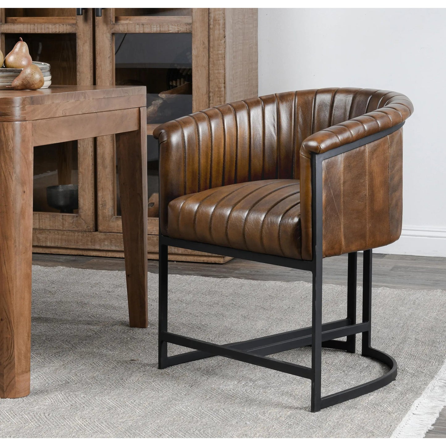 010 SI-2249254 | Lifestyle | Seville Dining Chair by Classic Home in brown. Made from top grain leather, iron in a traditional style.