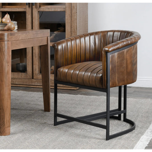 Seville Dining Chair by Classic Home in brown. Made from top grain leather, iron in a traditional style.