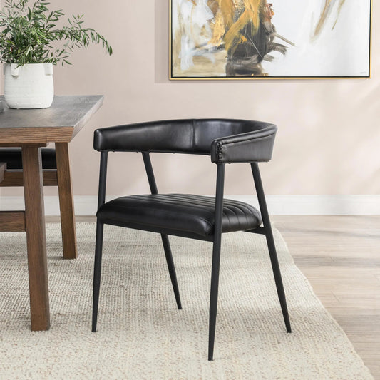 Preston Leather Dining Chair by Classic Home in jet black. Made from top grain leather, iron in a transitional style.