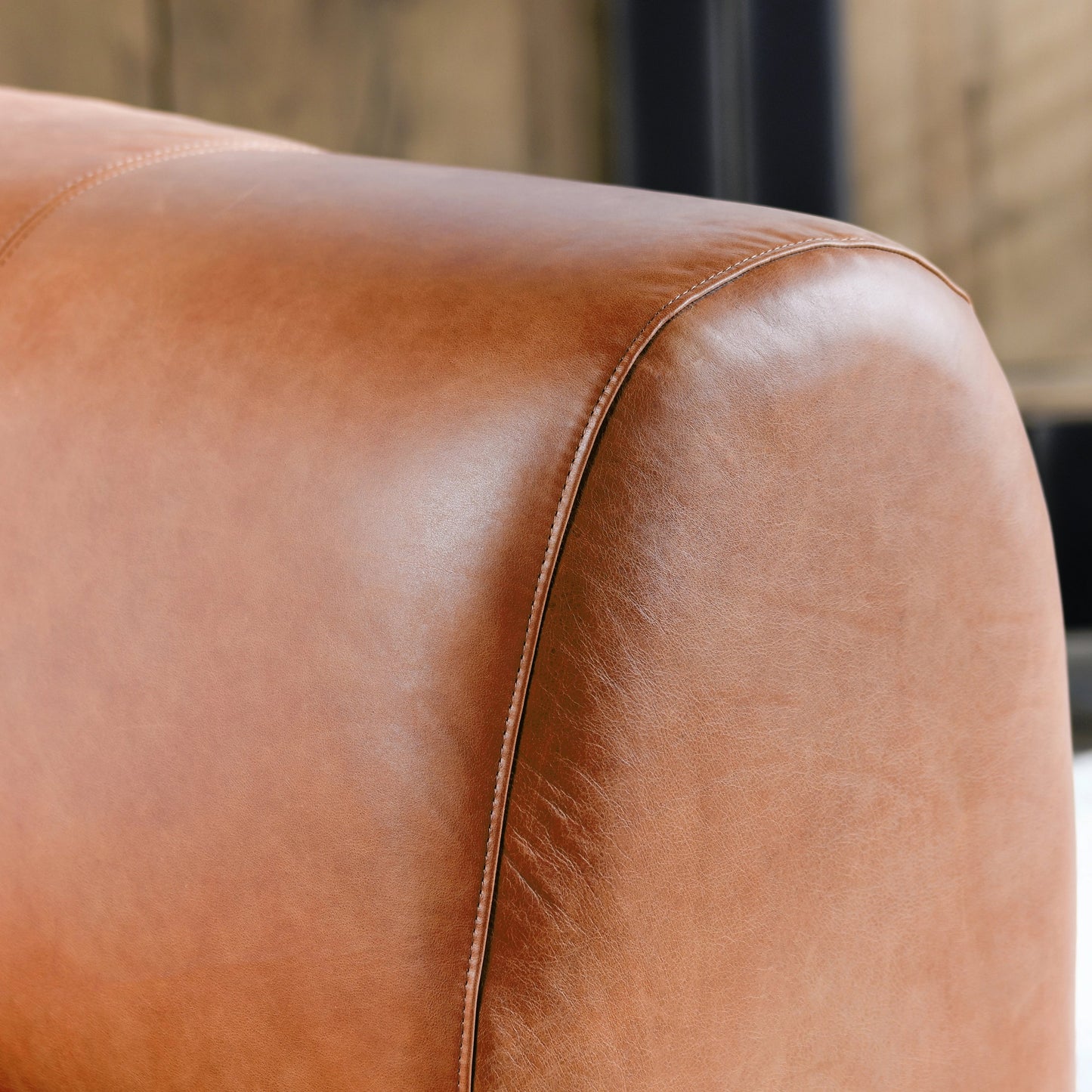 012 SI-2162625 | Closeup | Arcadia Leather Accent Chair by Classic Home in autumn brown. Made from top grain leather, ash wood in a transitional style.