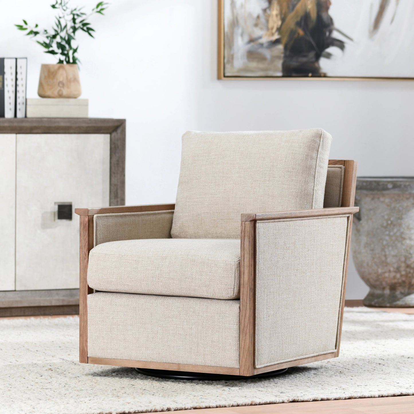 008 SI-2160325 | Lifestyle | Norman Swivel Accent Chair by Classic Home in natural. Made from ash wood, 88% polyester, 12% linen in a modern style.