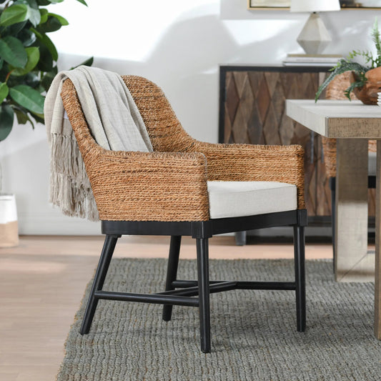 Rey Arm Chair by Kosas Home in wood. Made from mahogony wood, rattanpole, 100% polyester in a rustic style.