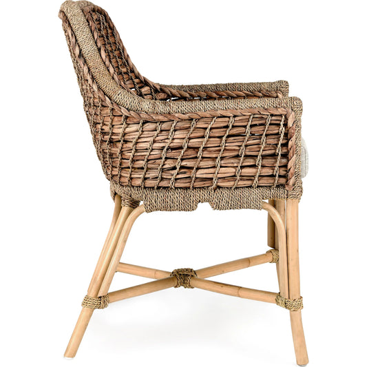 Nuevo Arm Chair by Kosas Home in wood. Made from rattanpole semipolished, 100% polyester in a cottage & farmhouse style.
