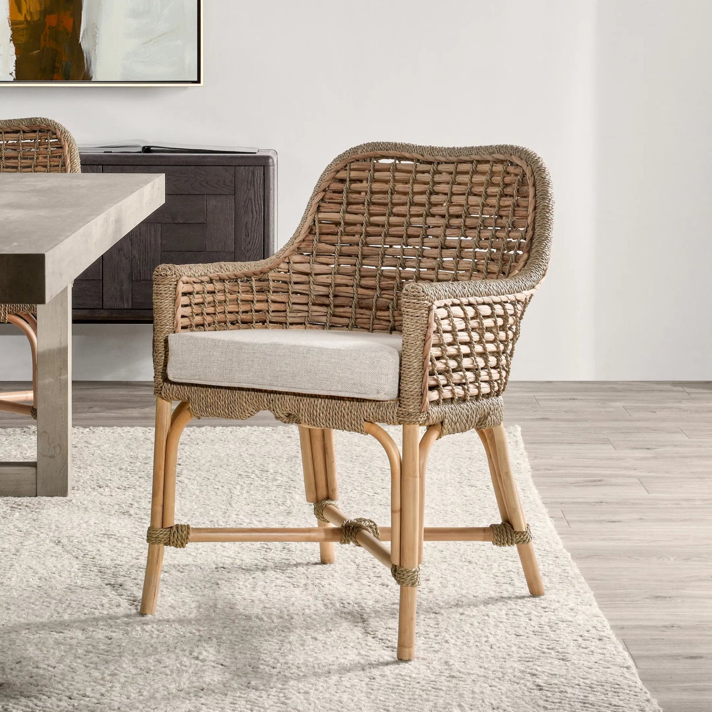 006 SI-2007520 | Closeup | Nuevo Arm Chair by Kosas Home in wood. Made from rattanpole semipolished, 100% polyester in a cottage & farmhouse style.