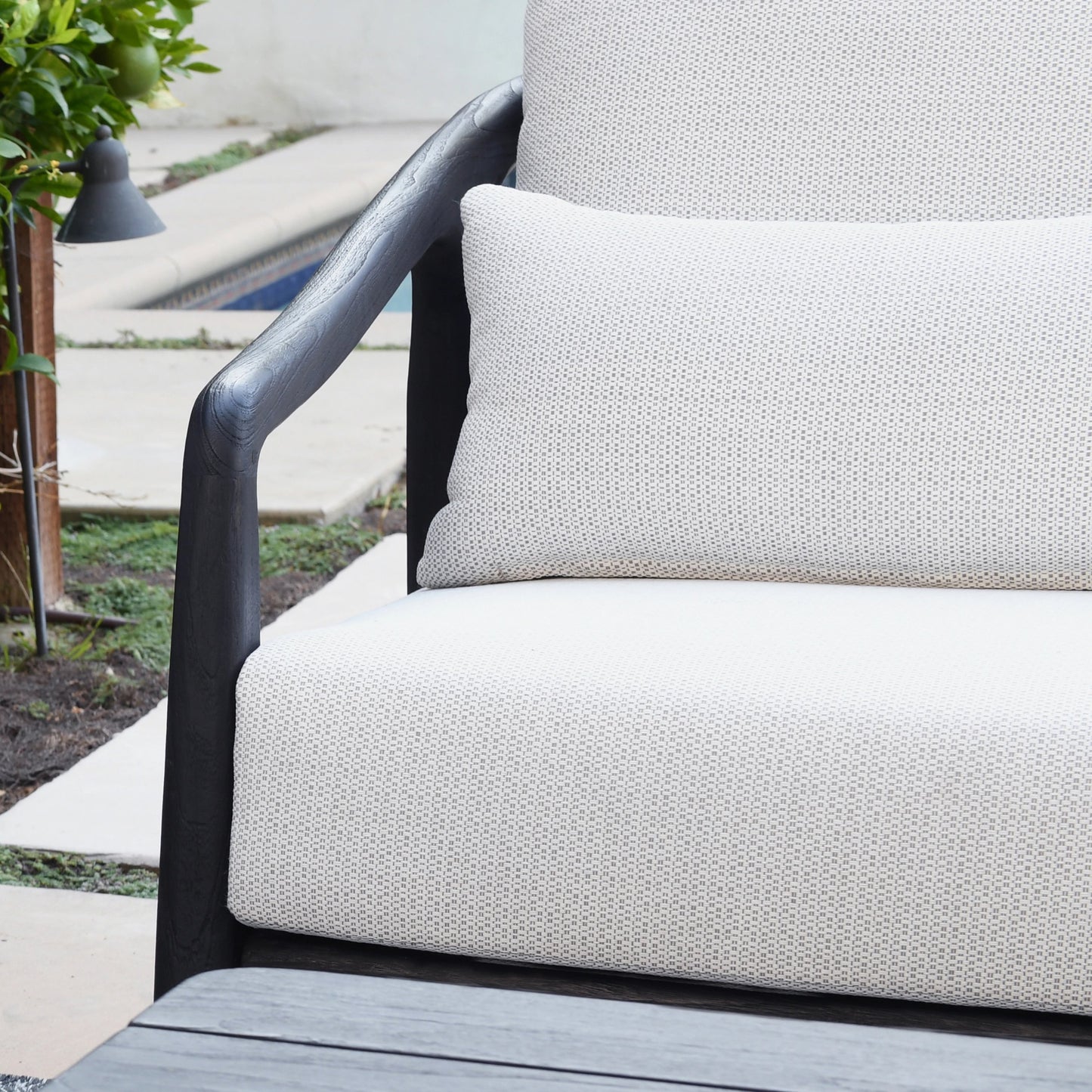 002 SI-2078805 | Closeup | Aria Outdoor Sofa by Classic Home in cream, black. Made from teak wood, wicker, 100% olefin in a modern style.