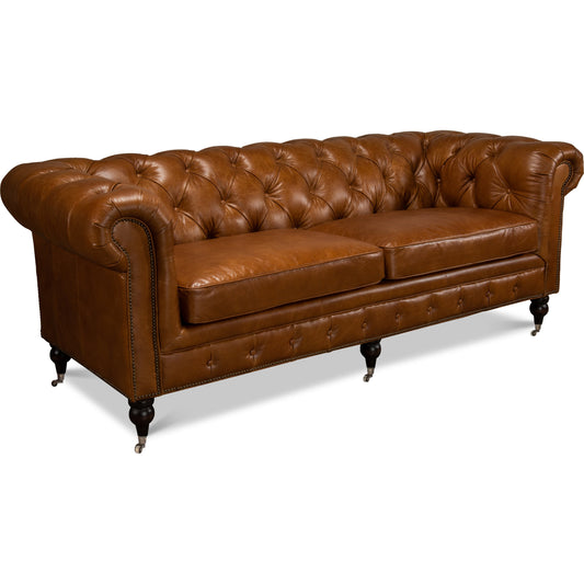 Tufted English Club Sofa by Sarreid Ltd. in brown and cuba brown leather. Made from hardwood, leather in a rustic style.