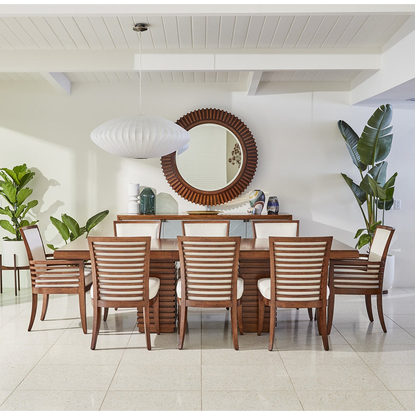 007 SR-836338 | Lifestyle | Peninsula Dining Table by Tommy Bahama Home. Made from unique in a modern style.