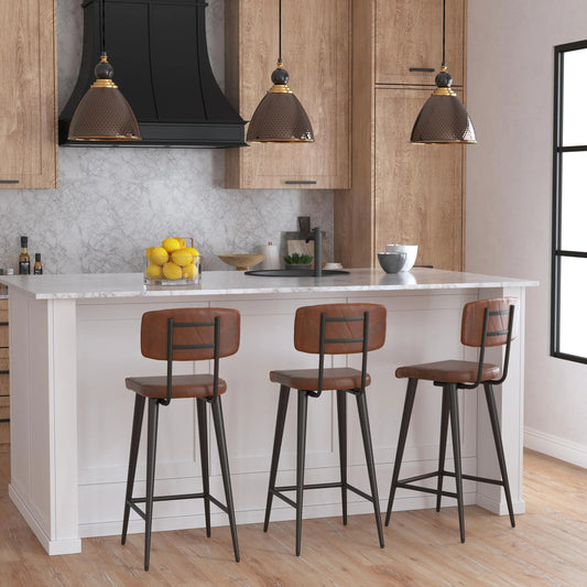 Saddle Counter Stool by Butler Specialty Company in dark brown and brown leather. Made from iron, leather, plywood, tris free fr foam in a rustic style.